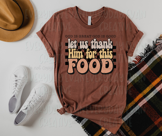 Image displays a t-shirt surrounded by miscellaneous clothing items. The shirt's design includes a checkered design behind text, in funky font of pale colors, that reads, "let us thank Him for this food." Above the design, serif font text reads, "God is great God is good."