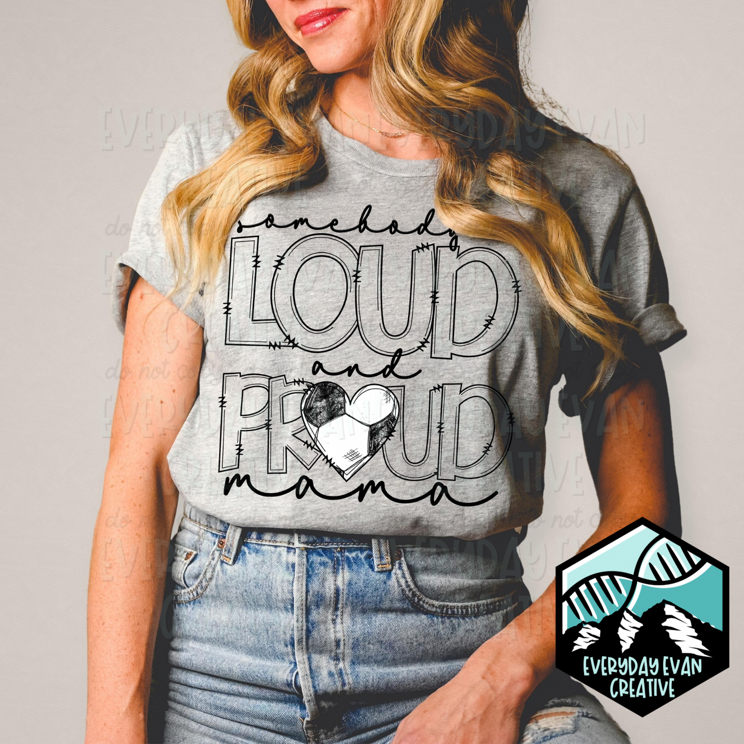 a shirt that reads loud and proud with a heart designed to look like a soccer ball