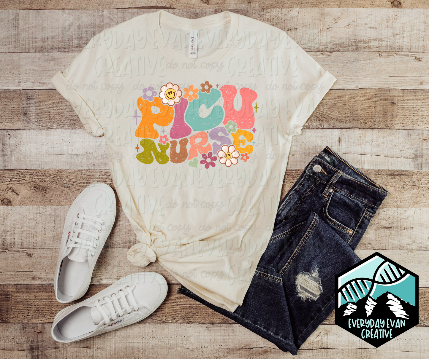 Image of a t-shirt with a retro PICU Nurse design with floral motifs