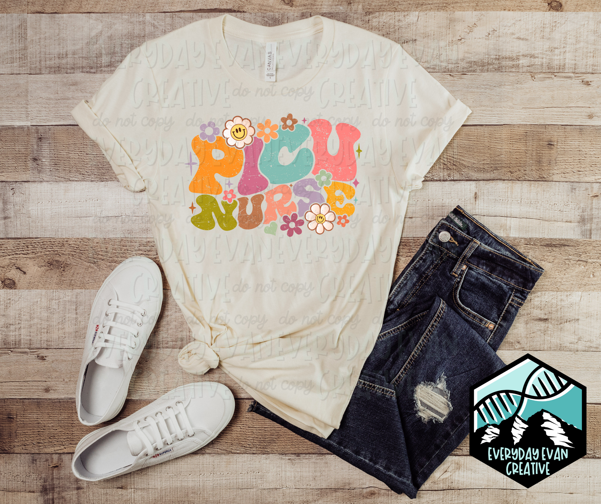 Image of a t-shirt with a retro PICU Nurse design with floral motifs
