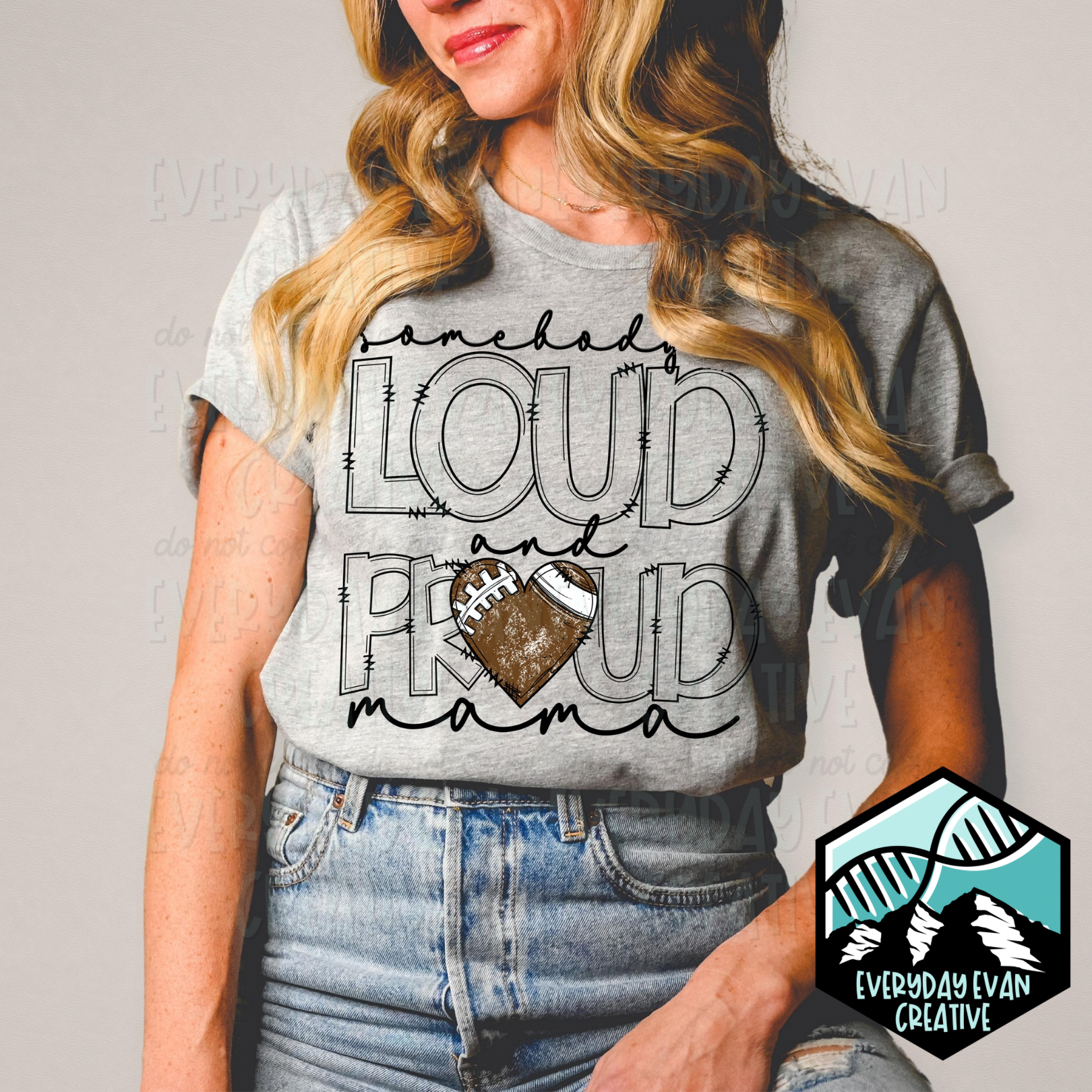 a shirt that reads loud and proud with a heart designed to look like a football