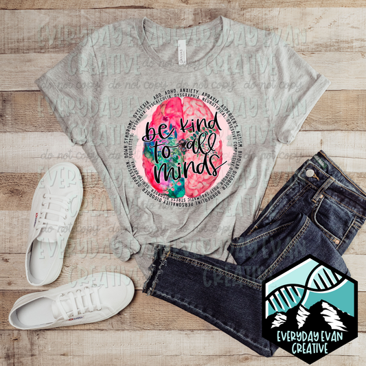 Image of a t-shirt with a circular design that read Be Kind to All Minds in the center, with a list of different neurodiversities and mental illnesses circling around it