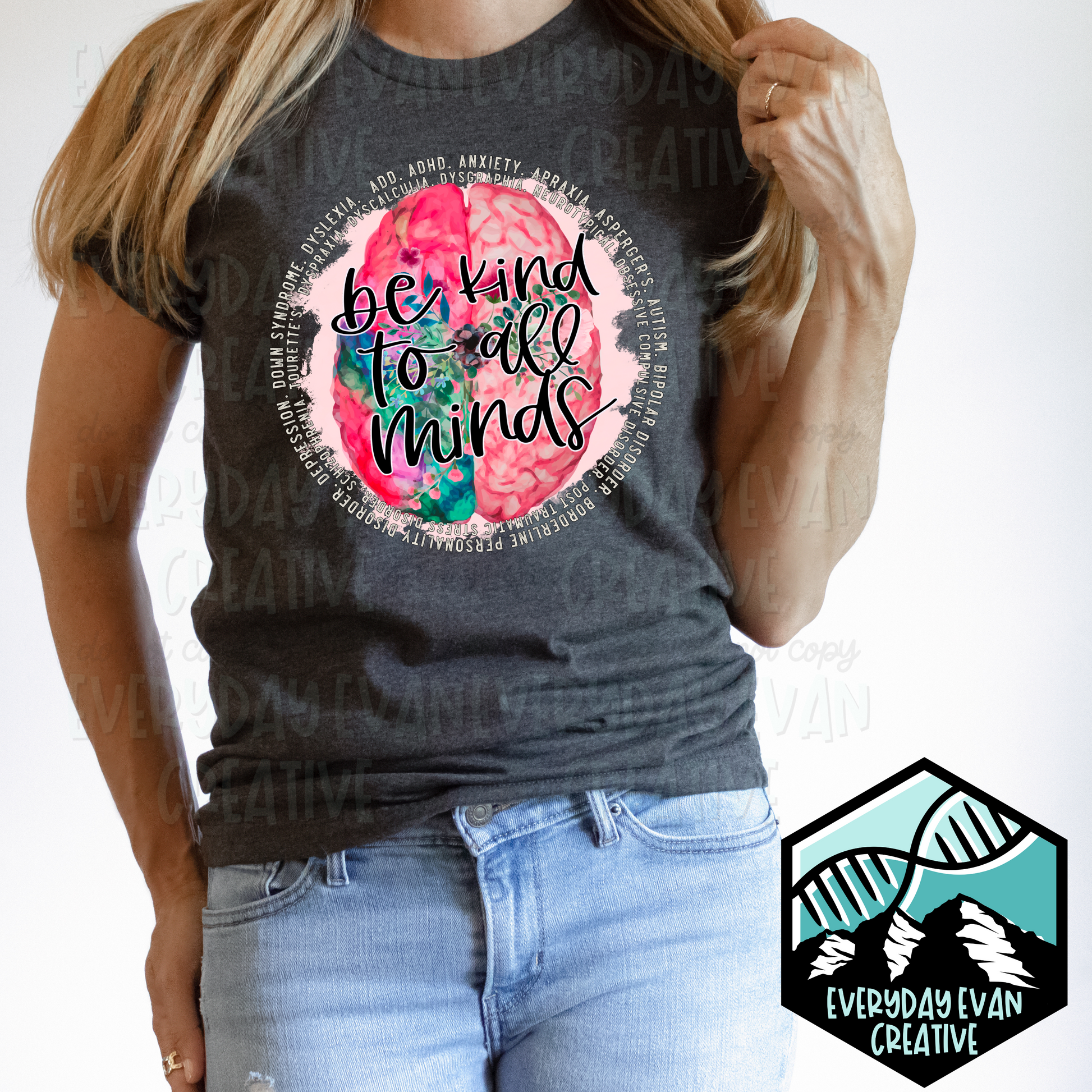 Image of a t-shirt with a circular design that read Be Kind to All Minds in the center, with a list of different neurodiversities and mental illnesses circling around it