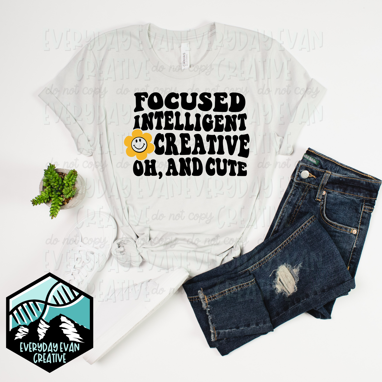 a shirt that reads focused intelligent creative oh and cute 