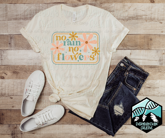 Image of a t-shirt with a retro No Rain, No Flowers design with floral motifs